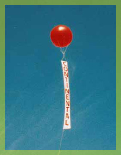  8ft. helium advertising balloon with vertical banner for more visibility. Advertising balloons are a cost effective means to generate traffic, FAST!